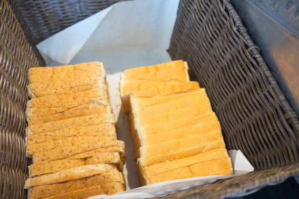 istock Basket with fresh sliced bread ready to eat 883042062