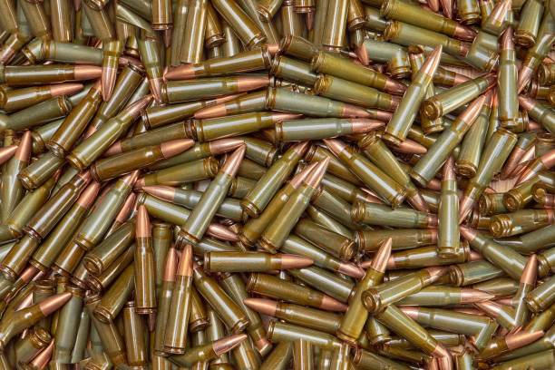 istock lot of bullets seamless texture 883042202