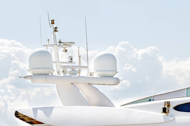 navigational equipment, sattelite communication antenna and radar mast of yachts or ship stock photo