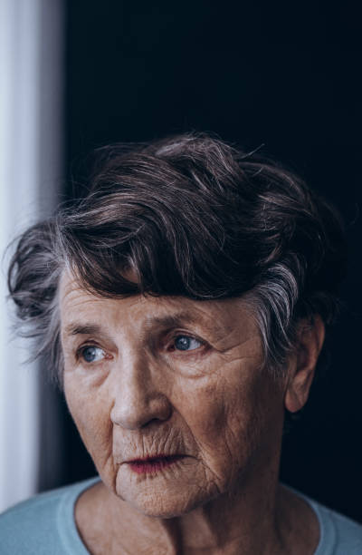 istock Old grandmother's face with wrinkles 883044940