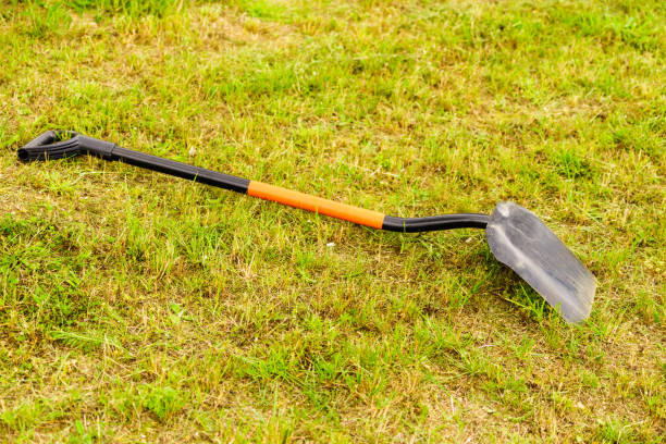 istock Shovel spade standing outside. 883054446