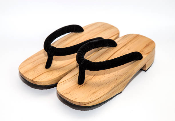 wooden Japanese sandals wooden Japanese sandals isolated on white background geta sandal stock pictures, royalty-free photos & images