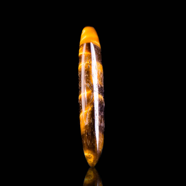 istock Pebble of tiger eye mineral 883055046
