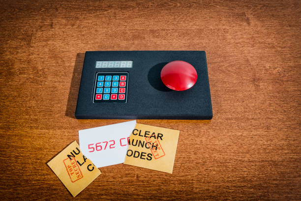 istock A TOP SECRET envelope torn open with the launch codes sitting on the desk 883057636
