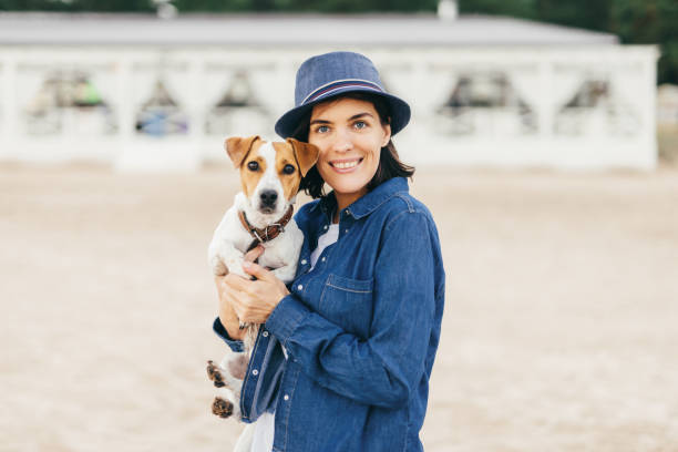istock Female poses with her favourite pet 883057952
