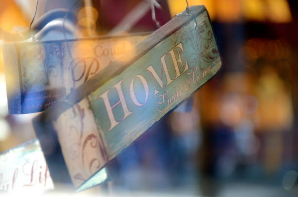 This adorable wooden home sweet home sign is at a window in a gift shop. Like so many people know, this is a truthful saying, the best place to be is at home, at any giving time. The softness in the picture made it more sentimental.