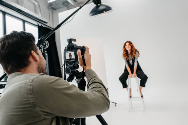 istock photographer and model on fashion shoot 883068808