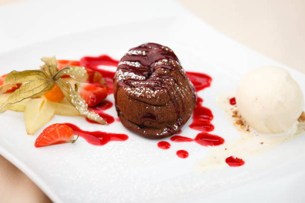 istock Chocolate fondant with ice cream 883069382