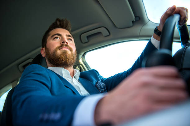 istock Businessman in car 883073074