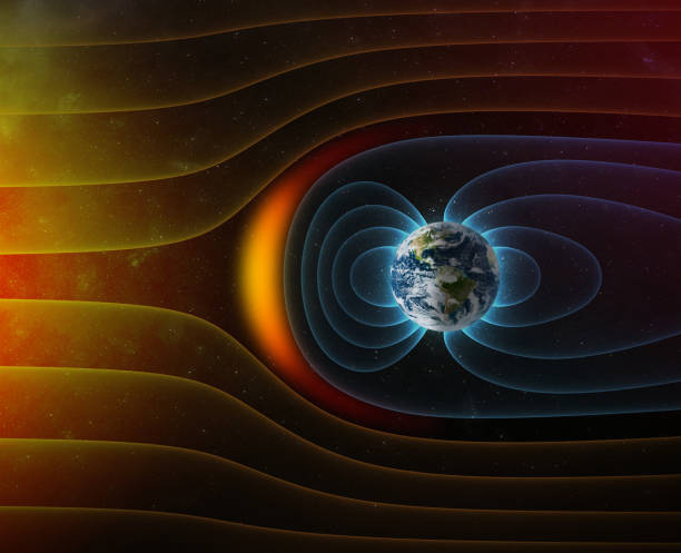 planet earth's magnetic field against sun's solar wind - electromagnetic imagens e fotografias de stock