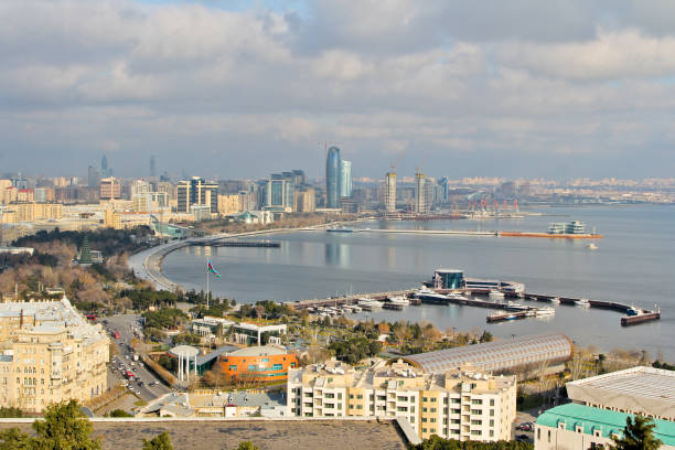 Panorama on the Baku Boulevard, National Park and Baku Yacht Club.Azerbaijan. Baku skyline panoramic view from the Martyrs Lane (Alley of Martyrs) viewpoint. Right on the Baku Yacht Club on the Caspian Sea. baku national park stock pictures, royalty-free photos & images