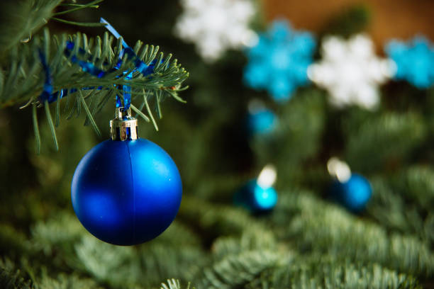 istock Christmas ball on the branches fir. 883080864