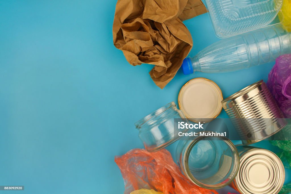 Closeup of waste on blue background. Top view. Recycling Stock Photo