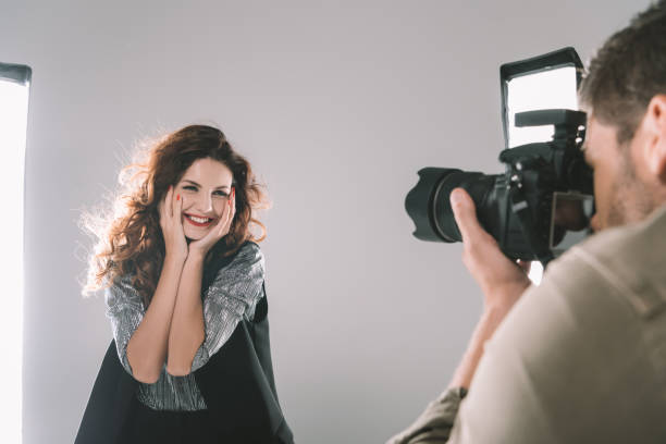 istock photographer taking photos with model 883096128