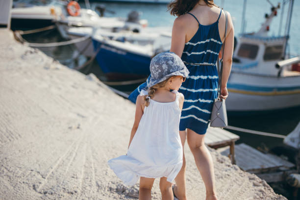 istock Walk near the moored boats 883100166