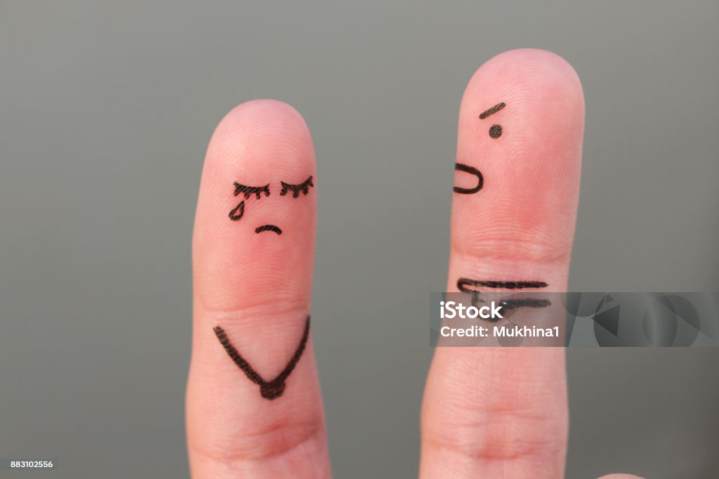 Fingers art of family during quarrel. Concept of husband shouts on wife Couple - Relationship Stock Photo