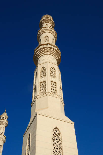 istock Tower minaret against a bright blue sky, Alexandria, Egypt 883103644