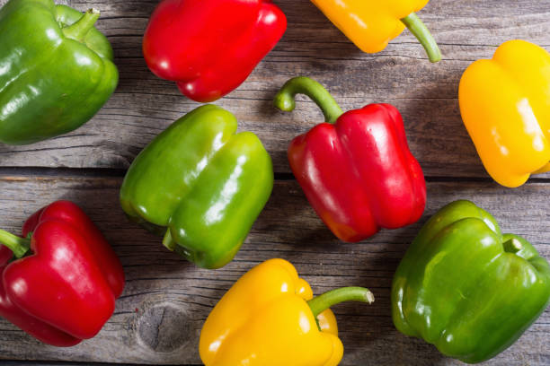 istock Colorful green , red and yellow peppers 883109822