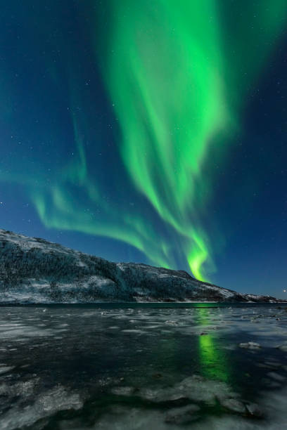 istock Aurora Northern Polar light in night sky over Northern Norway 883110118
