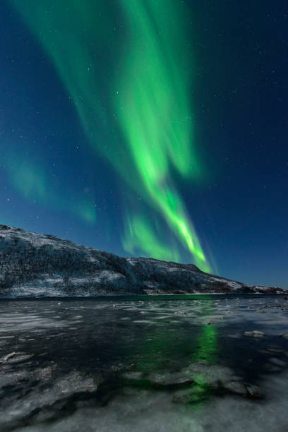 istock Aurora Northern Polar light in night sky over Northern Norway 883110254