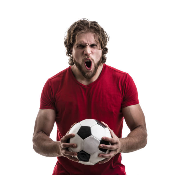 istock Male athlete / fan in red uniform celebrating on white background 883110842