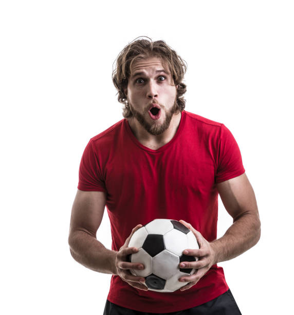 istock Male athlete / fan in red uniform celebrating on white background 883110848