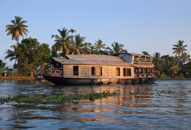 istock Houseboat on backwaters in Kerala, India 883114368