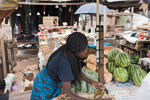 market stalls and saleswoman in Livingstone, Zambia.