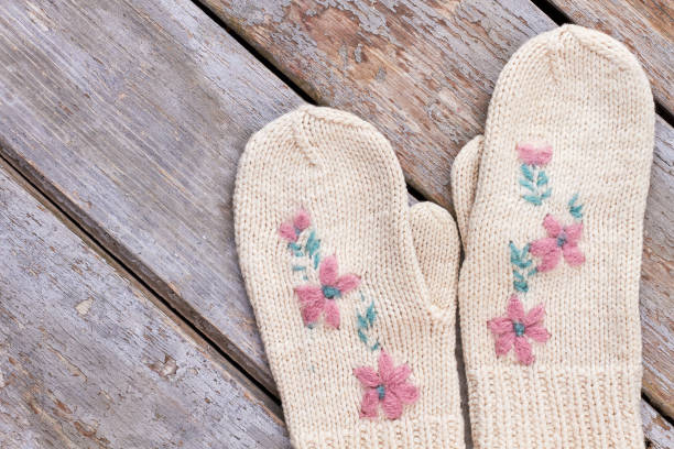 istock Pair of beautiful female mittens. 883121398
