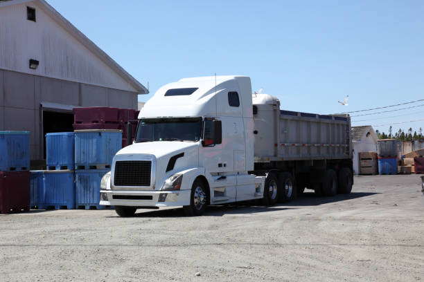 istock Semi-truck at an industrial site 883125206