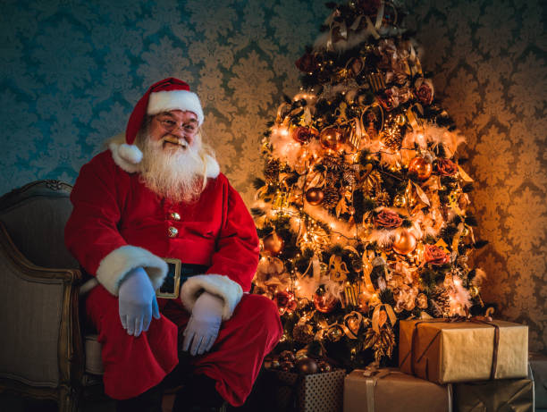 istock Santa sitting in a chair 883125362