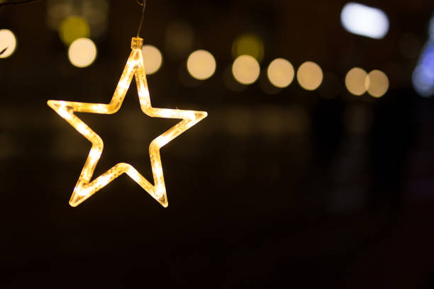 istock Neon Star, Christmas Decoration, Night, Car lights 883132580