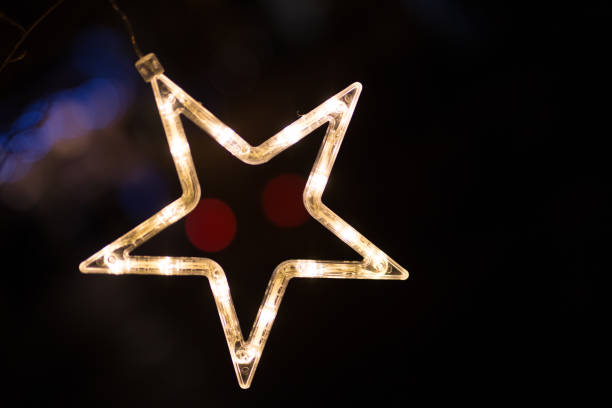istock Neon Star, Christmas Decoration, Night, Car lights 883132656