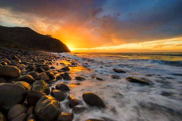 istock Spectacular sunset over the ocean, Risco Beach, Gran Canaria 883133732