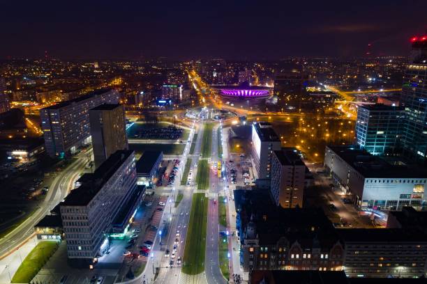 istock Aerial drone view of Katowice at night 883136306