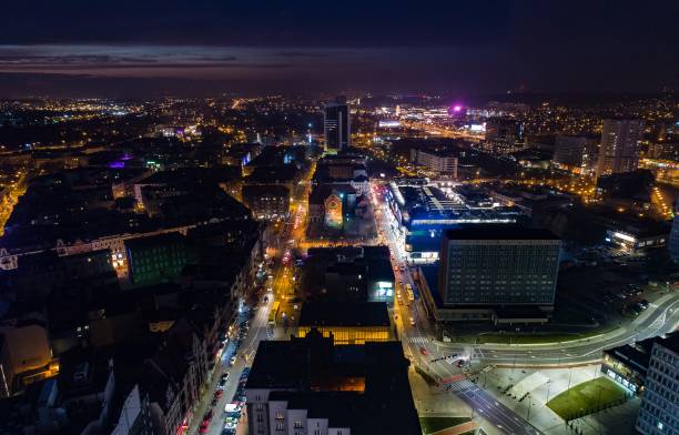 istock Aerial drone view of Katowice at night 883136474