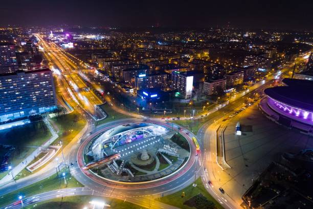 Aerial drone view of roundabout in Katowice at night. Aerial drone view of roundabout in Katowice at night. Silesia, PolandAerial drone view of roundabout in Katowice at night. Silesia, Poland katowice stock pictures, royalty-free photos & images