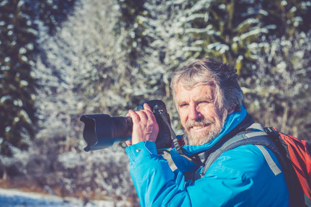 istock Senior Mountaineer in Alps, Winter 883136576