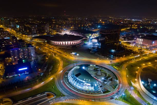 vista aérea drone de rotonda en katowice en la noche. - silesia fotografías e imágenes de stock