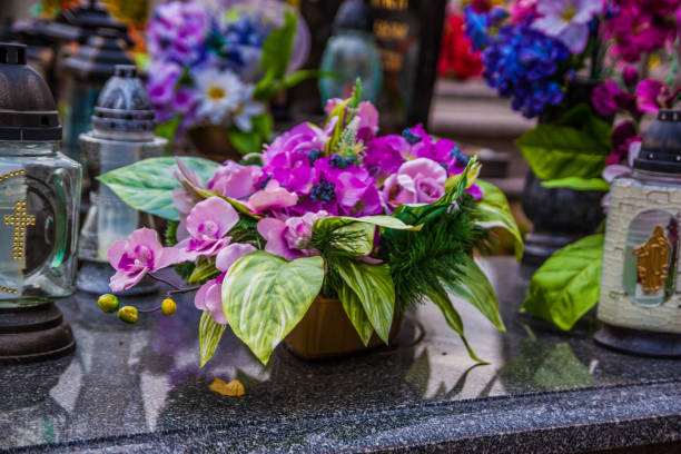 istock Colorful candles on the cemetery at All Saints Day 883142702