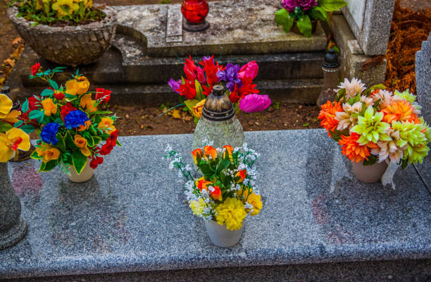 istock Colorful candles on the cemetery at All Saints Day 883142848