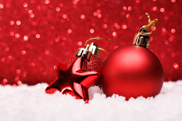 istock Christmas composition of Christmas tree toys on a red background 883143120