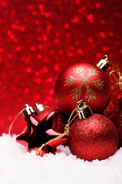istock Christmas composition of Christmas tree toys on a red background 883146356