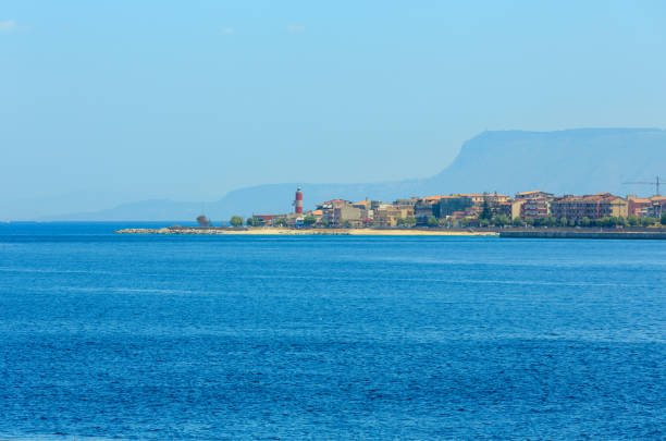 View of the Messina sea strait and coastline from the side of the ferry to Sicily island, Italy