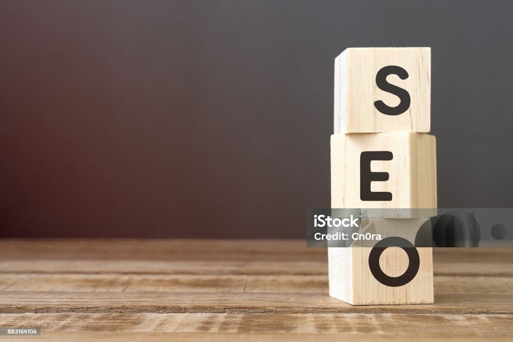 SEO Words on Wooden Block Search Engine, Table, Wood - Material, Alphabet, Cube Shape Search Engine Stock Photo