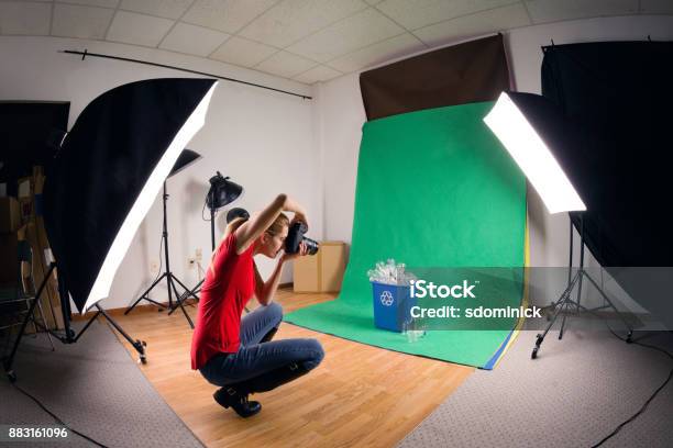Stock Photographer Taking Studio Photos Stock Photo - Download Image Now - Photo Shoot, 45-49 Years, Adult