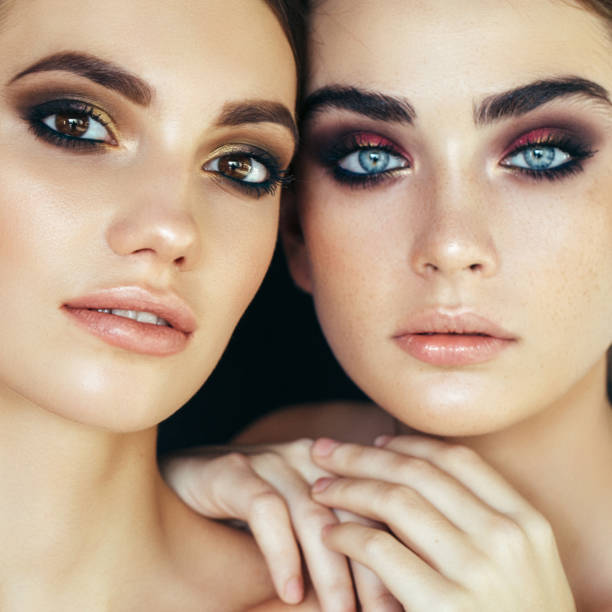 Portrait of two fresh and lovely women Portrait of two fresh and lovely women eyeshadow stock pictures, royalty-free photos & images