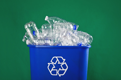 Green plastic bottles ready for recycling