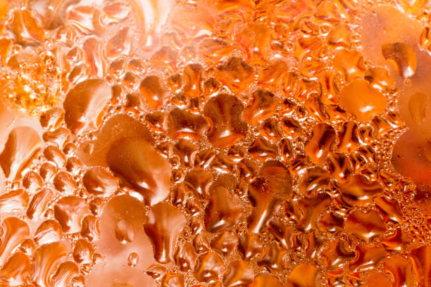 abstract background of drops on a red glass