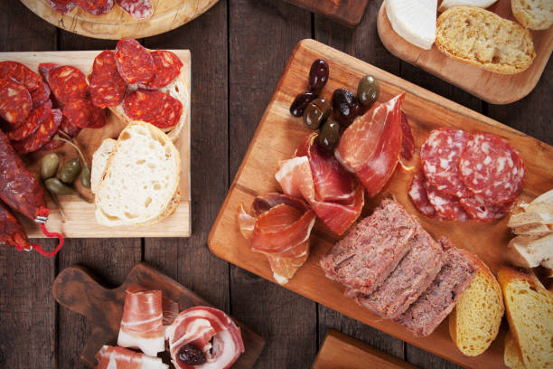istock Charcuterie board with cured meats 883181388